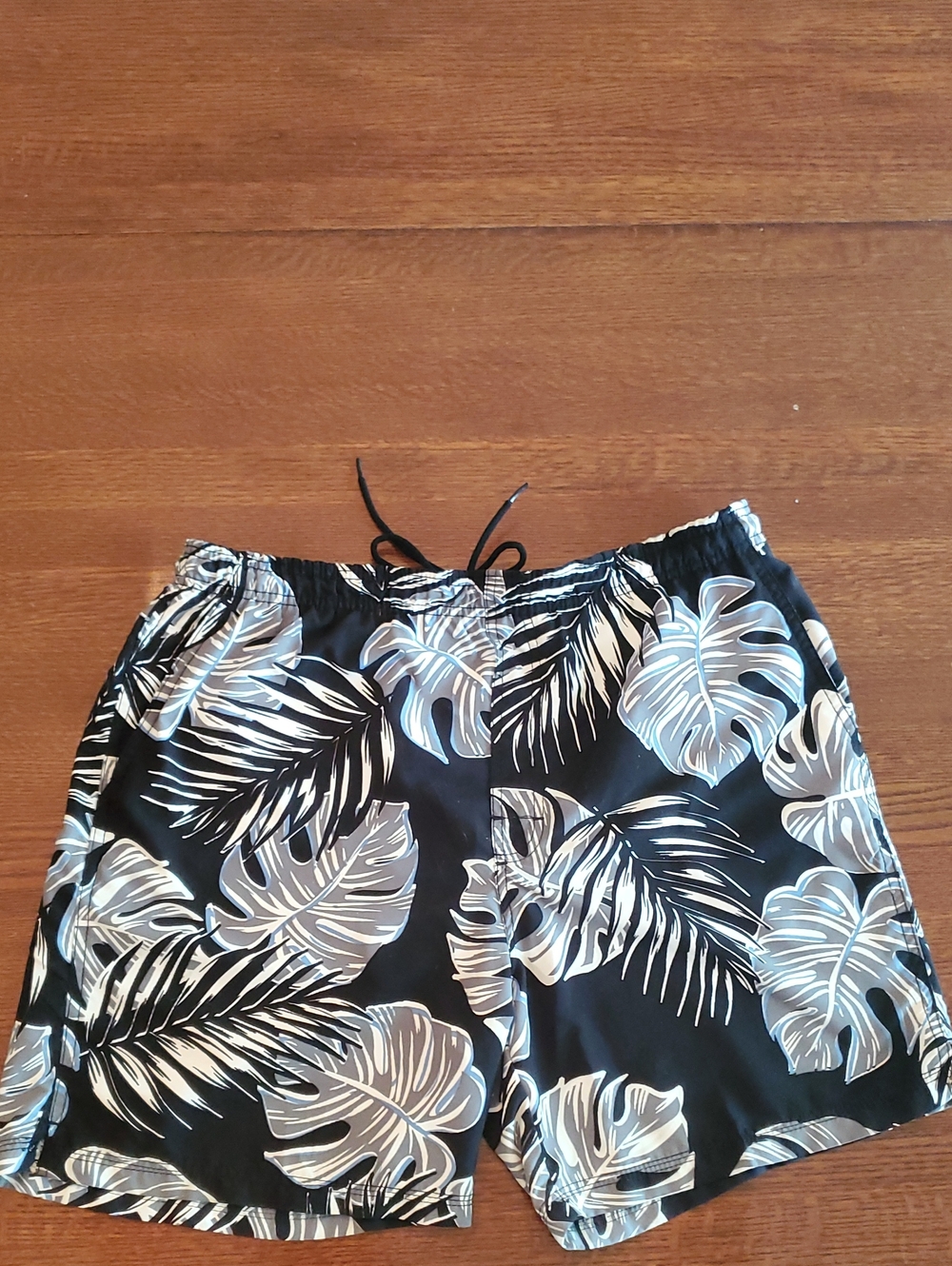 Black Swim Trunks with White Tropical Leaf Print